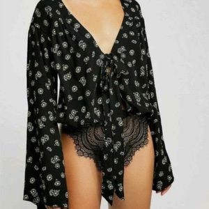 Free People black daisy print bodysuit, size small